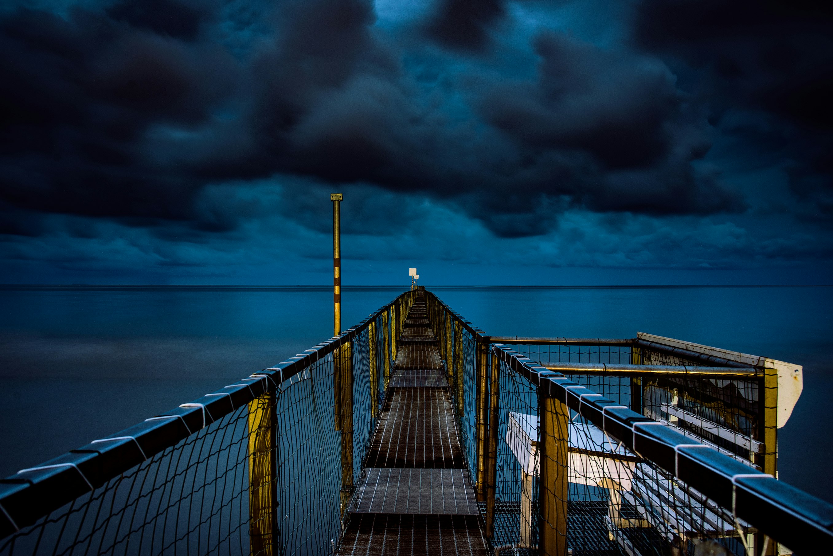 photo of bridge with fence